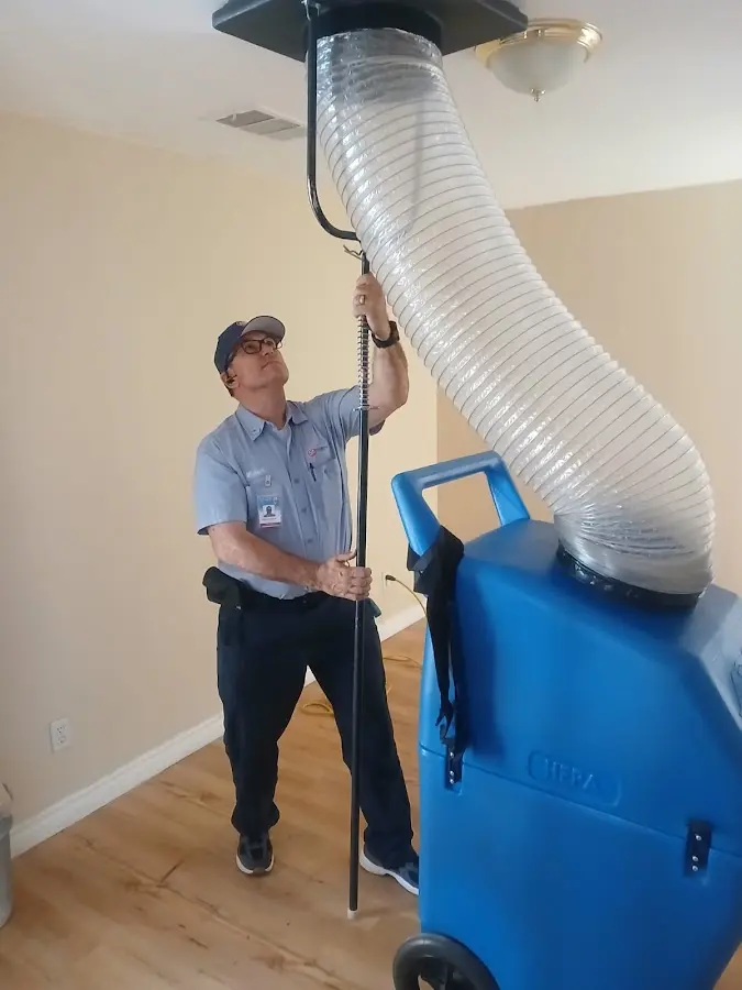 HVAC Installation technician using HEPA equipment in Butner